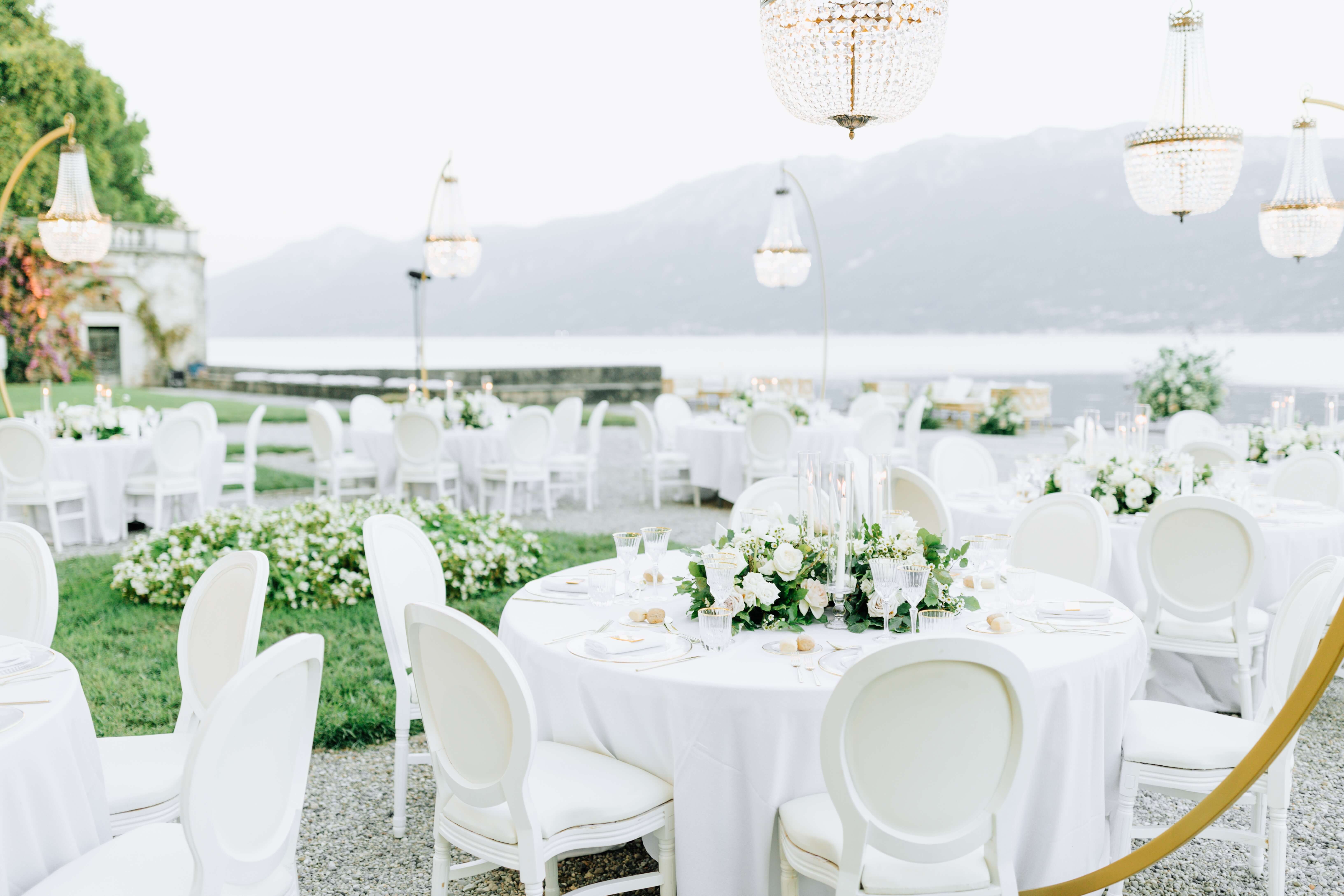 Garden white wedding reception decor on the shores of lake como