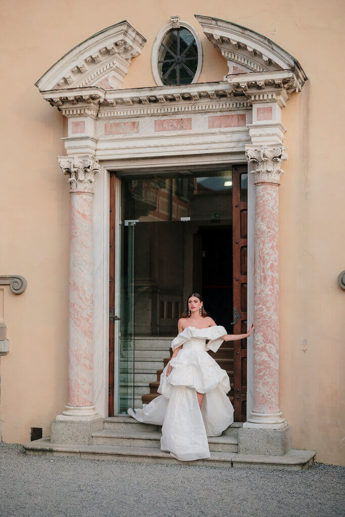 Bridal portrait by entrance at Villa Cipressi - Lake Como wedding planner